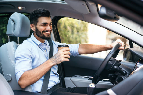 istock Businessman driving a car 821529008