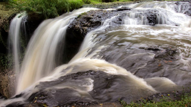 istock a very beautiful waterfall, water falling from a river, A close up view of water falling over, background 821529290