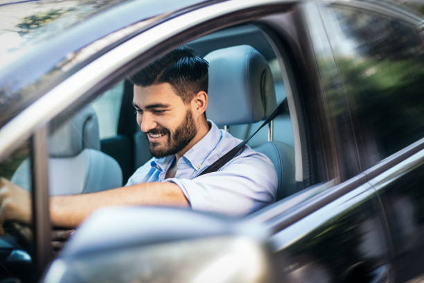 istock Businessman driving a car 821533448