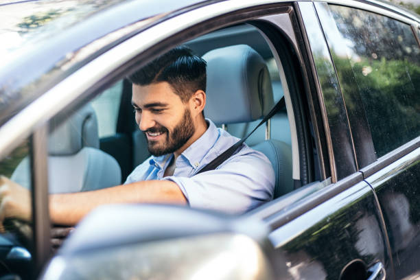 istock Businessman driving a car 821535536