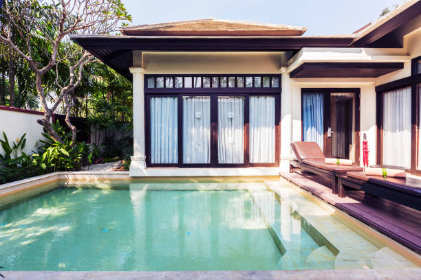 istock Luxury villa with swimming pool 821536046