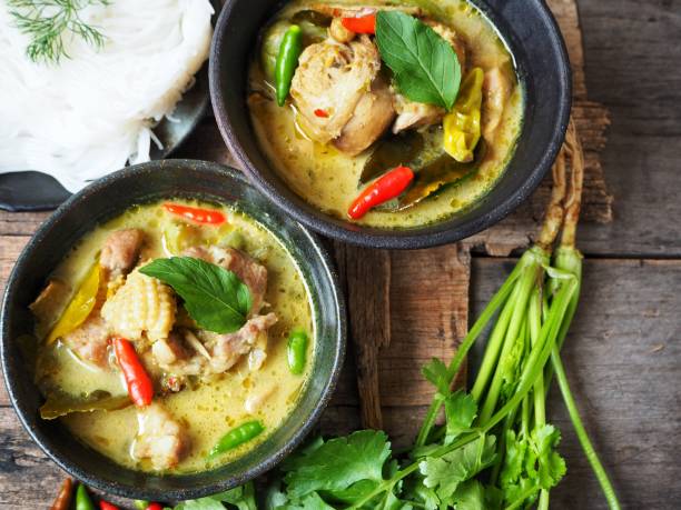 istock Green curry chicken with rice noodles 821547728