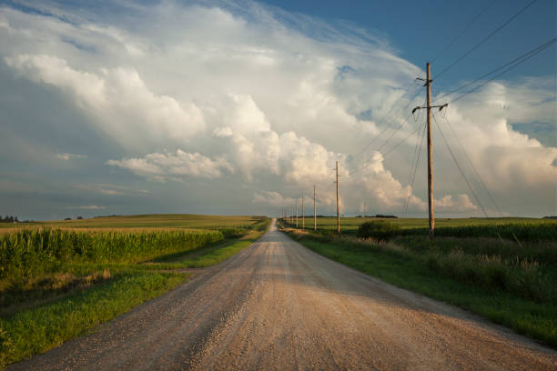 istock Rural midwest road with dramatic clouds at sundown 821548516