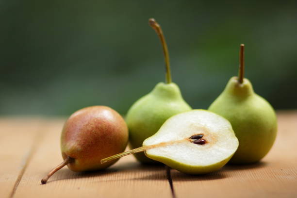 istock Pears on the background of a green bokeh 821551934
