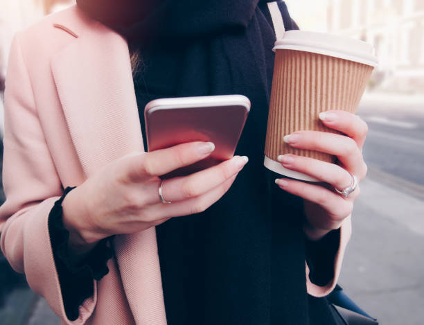 istock Young woman using with her mobile phone 821559324