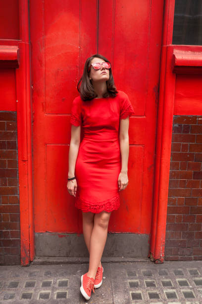 istock Beautiful woman in red 821587386