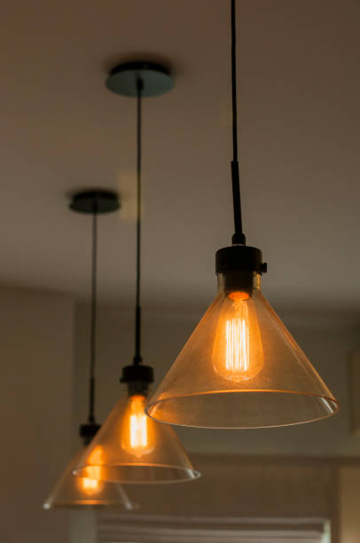 istock Retro / Vintage lighting bulbs hanging for decorative 821593660