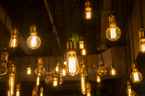 istock Retro / Vintage lighting bulbs hanging for decorative 821594226