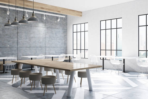 istock Cafe with tables, round chairs, concrete 821595206