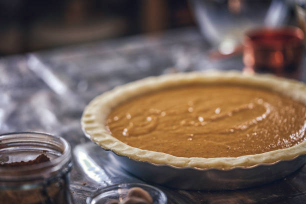 istock Preparing Pumpkin Pie for the Holidays 821595254