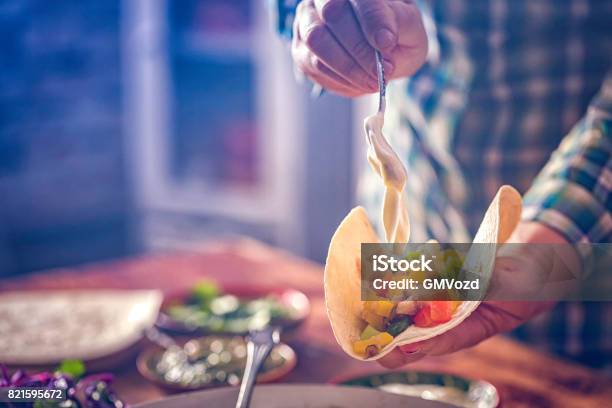 Preparing Mexican Tacos With Spicy Salsa And Shrimps Stock Photo - Download Image Now