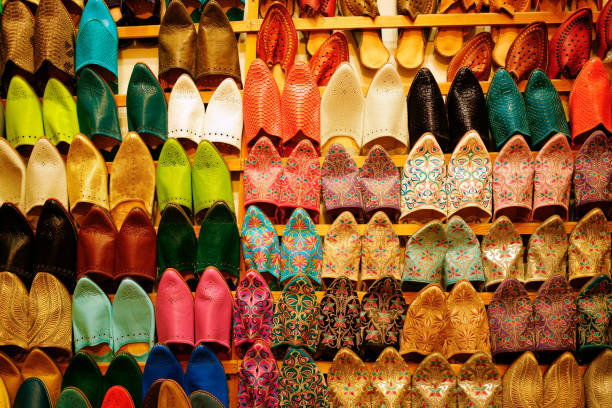colorful assortment of bobouches - craft market morocco shoe imagens e fotografias de stock
