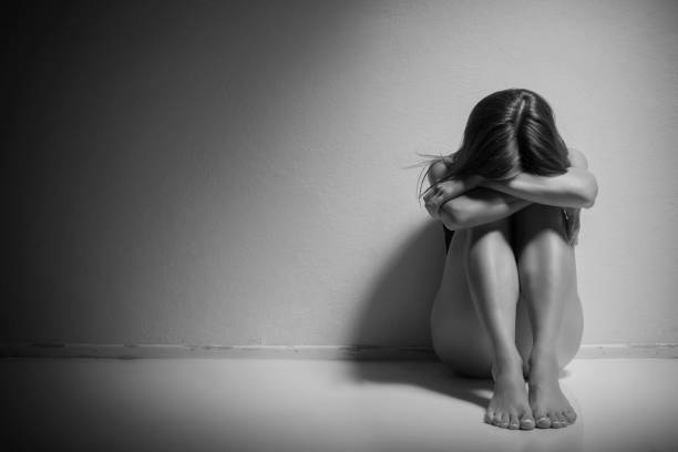 istock Depressed young crying woman 821612176
