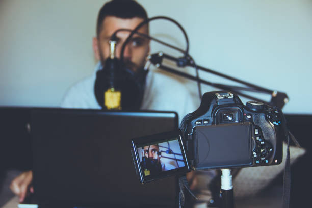 istock Blogger recording video blog 821612238