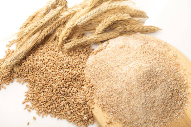 istock Coarse flour and wheat with spikelets 821621310
