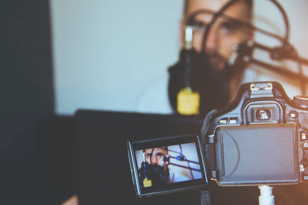 istock Male Vlogger recording a vlog 821637398