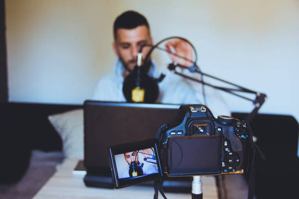 istock Male Vlogger recording a vlog 821640436