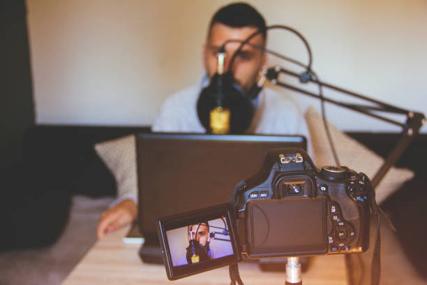 istock Male Vlogger recording a vlog 821640572