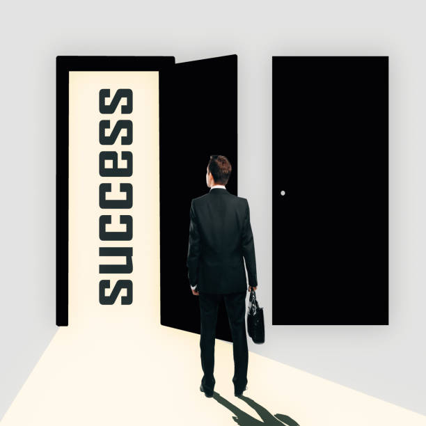 istock Man looking at success door 821643180