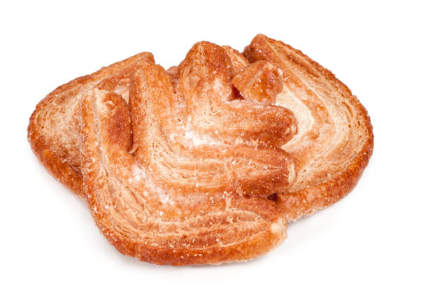 istock tasty Christmas tree shape puff pastry against white background 821652756