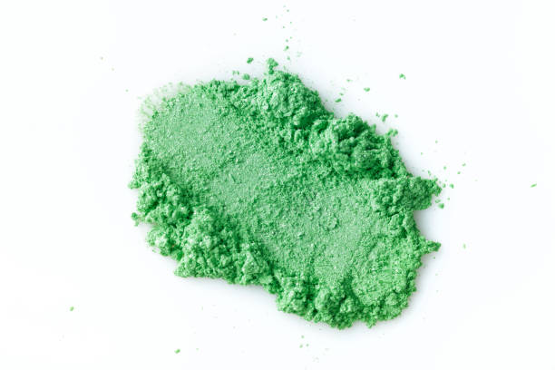 istock Crushed green eye shadow isolated on white background 821658994