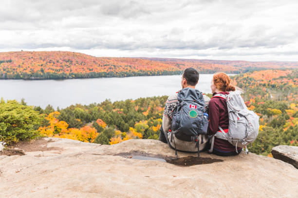 istock Couple looking at panorama from the top 821662016