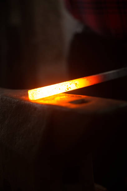 istock Hot Iron on Anvil in Blacksmith Shop 821662922