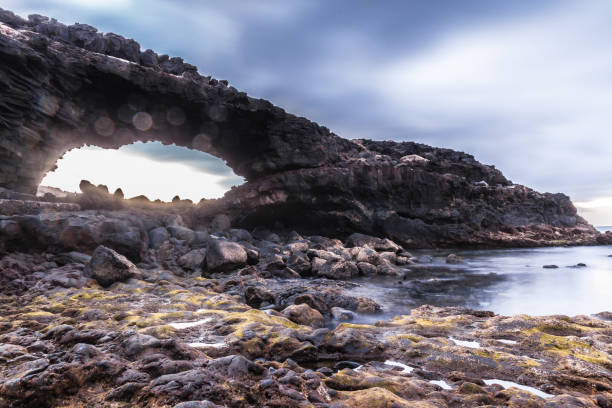 istock sunset at Cueva Negra beach 821672744