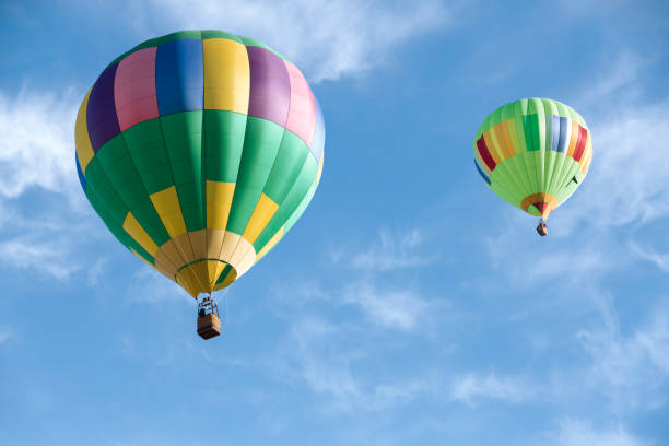 istock Hot air balloons in blue sky 821675550
