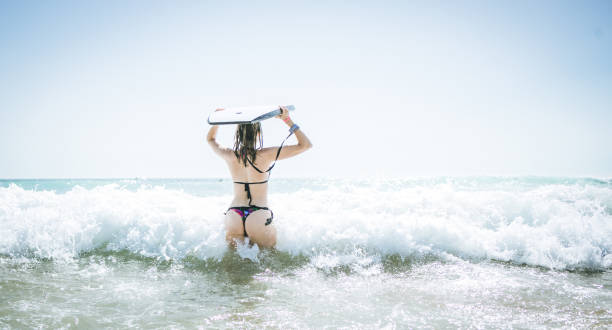 istock Body board woman 821685508