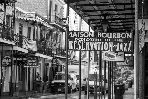 NEW ORLEANS, LOUISIANA - AUGUST 25: Street sign with Pubs and bars  in the French Quarter, downtown New Orleans on August 25, 2015.