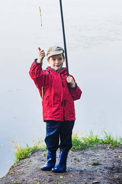 istock Little boy on fishing 821694744