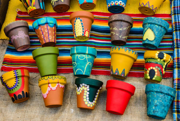 Colorful painted plant pots at a weekend fair in San Telmo neighborhood, Buenos Aires stock photo