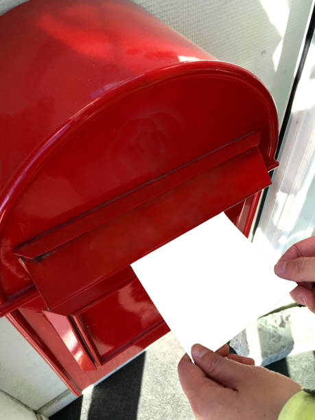 istock a girl is send her postcard to someone she is missing 821709282