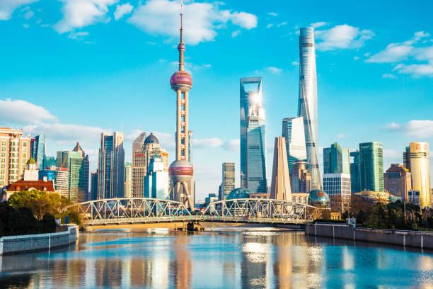 Shanghai Skyline Shanghai skyline behind the Garden Bridge (The Bund view) promenade shanghai stock pictures, royalty-free photos & images