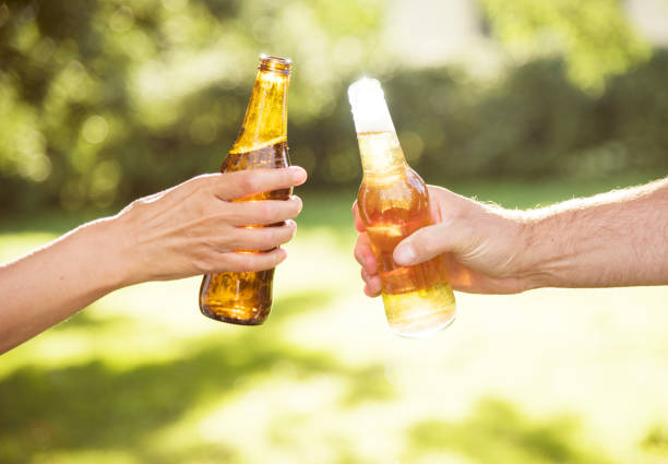 istock Cheers Beer Alcohol Celebration Outdoors Toast Concept 821715318