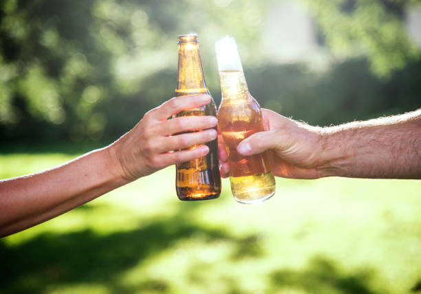 istock Cheers Beer Alcohol Celebration Outdoors Toast Concept 821715354