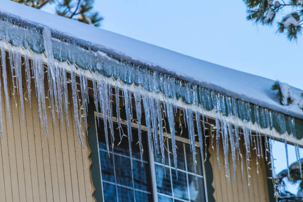 istock Icicle hanging from the side of the roof 821716230