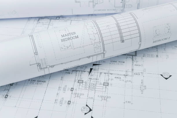 istock architectural drawing paper rolls of a dwelling for construction 821716290