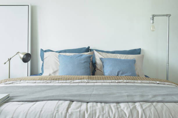 istock Minimal style bedroom interior in blue and gray color scheme 821719312