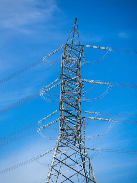 istock a high voltage power pylons against blue sky 821724062