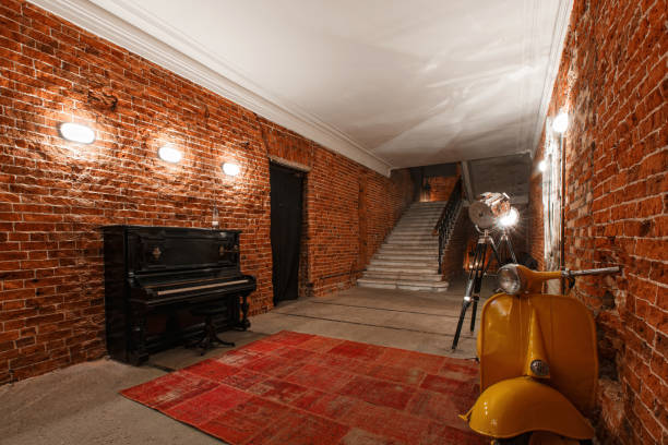 istock Modern industrial creative workspace. staircase with textured brick walls to the attic loft 821731168