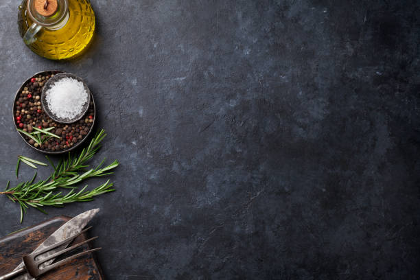 istock Cooking ingredients and utensils on stone table 821734624