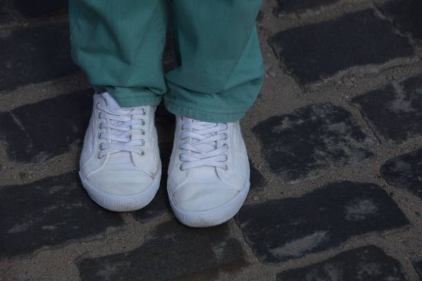 istock A man ties up his shoelaces 821742358