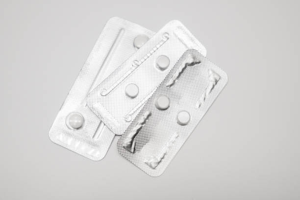 Emergency contraceptive pills on white background Emergency contraceptive pills on white background morning after pill stock pictures, royalty-free photos & images