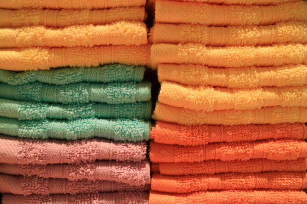 istock Stack of folded vibrant color bath towels, Texture, Background 821755420