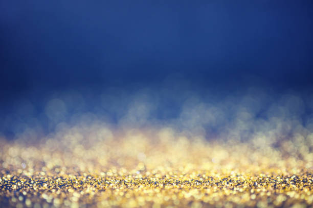 luxury golden and blue bokeh background stock photo