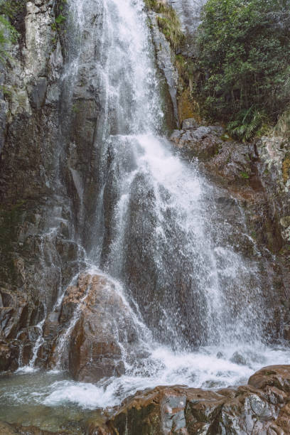 istock Close-Up Of waterfall  Flowing Through Rocks 821765398