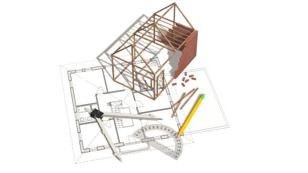 istock House project - house under construction on blueprint - project for construction industry 821767980