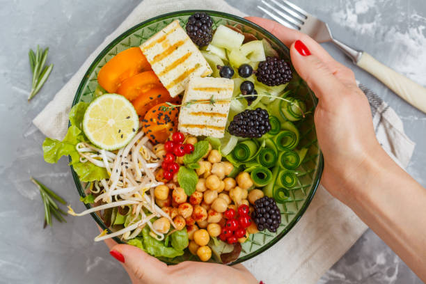 istock buddha bowl of vegetables, chickpeas and tofu. 821768138